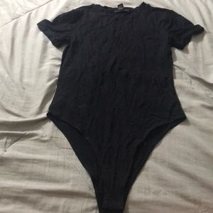 A black short sleeve shirt that connects at the bottom size small!